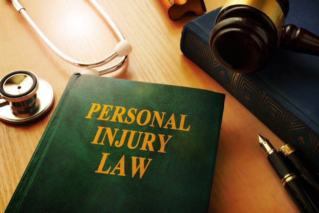 79824193 - personal injury law book on a table.